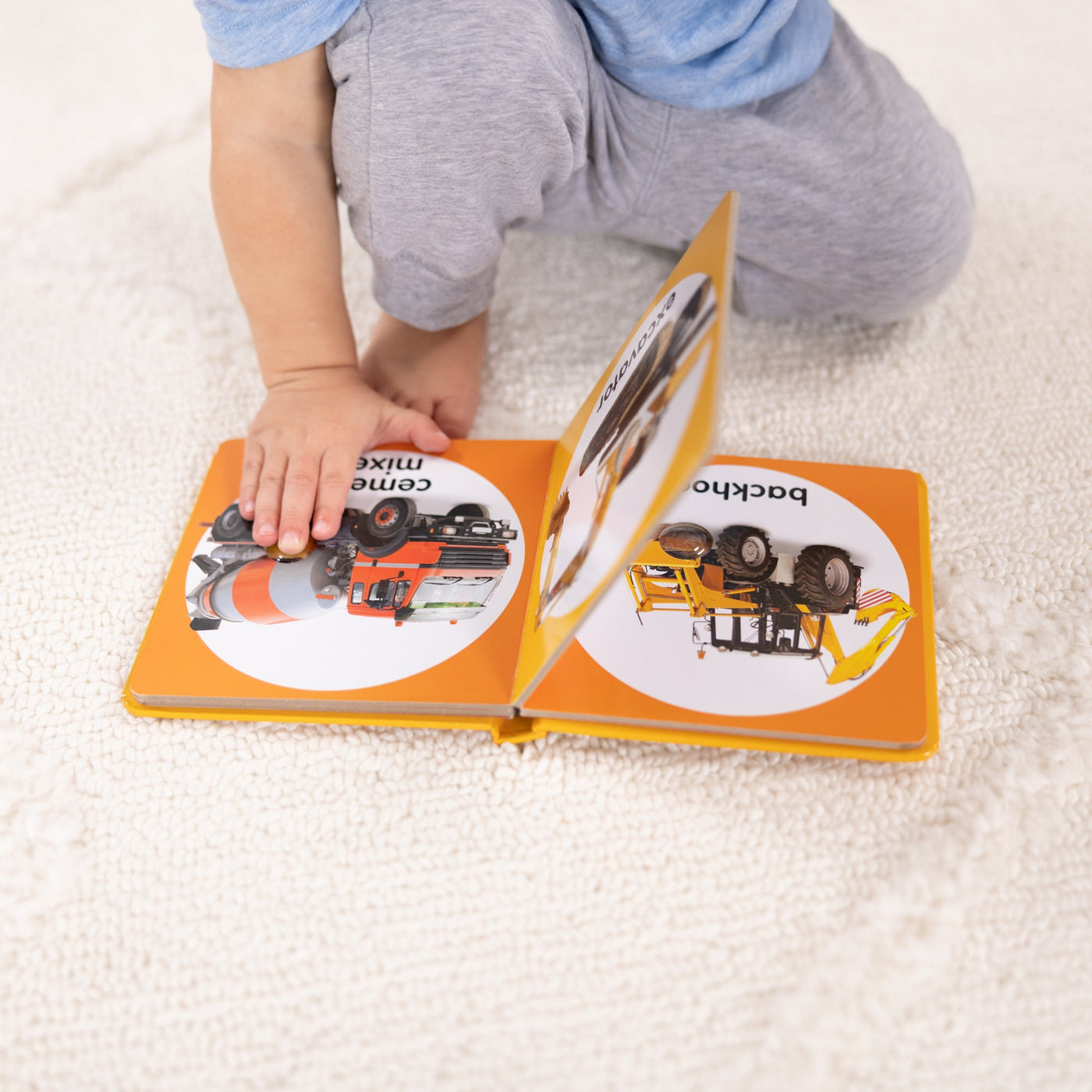 Poke-a-Dot: Construction Vehicles Board Book M6